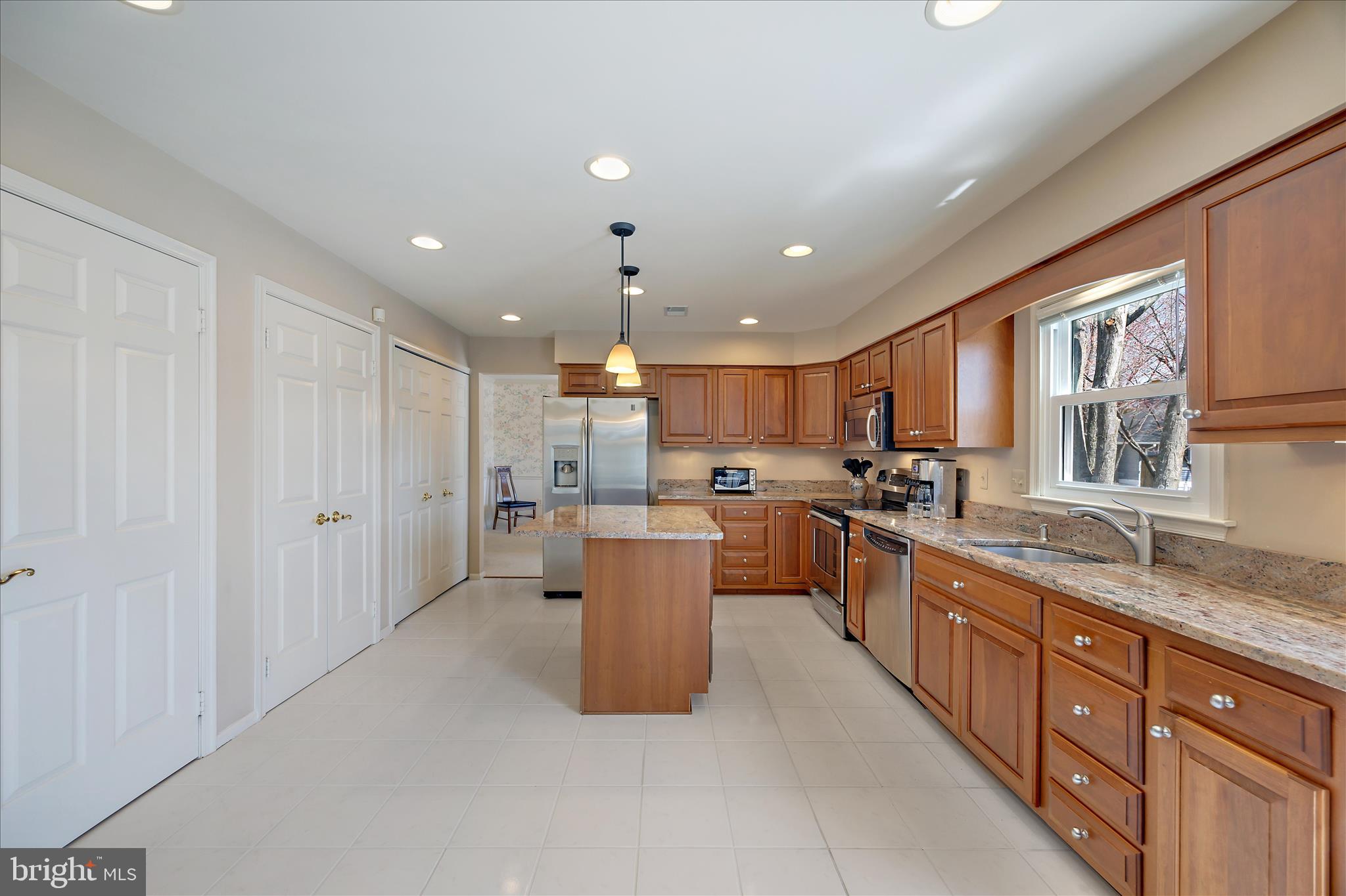 253 Milthorn Court Riva, MD 21140 - Photo 15 of 71 a large kitchen with stainless steel appliances lots of counter top space