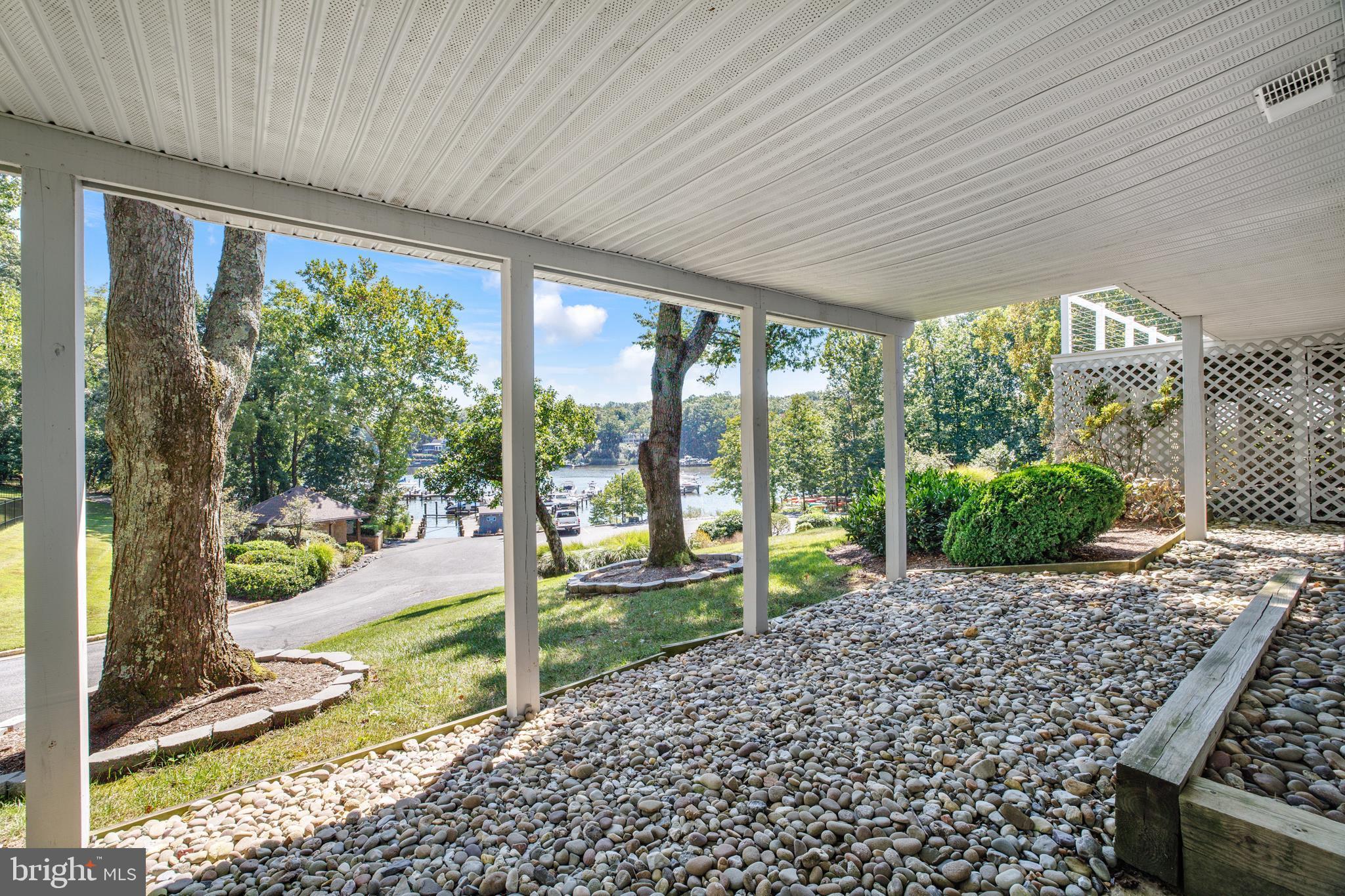 253 Milthorn Court Riva, MD 21140 - Photo 2 of 71 a view of a porch with furniture and garden