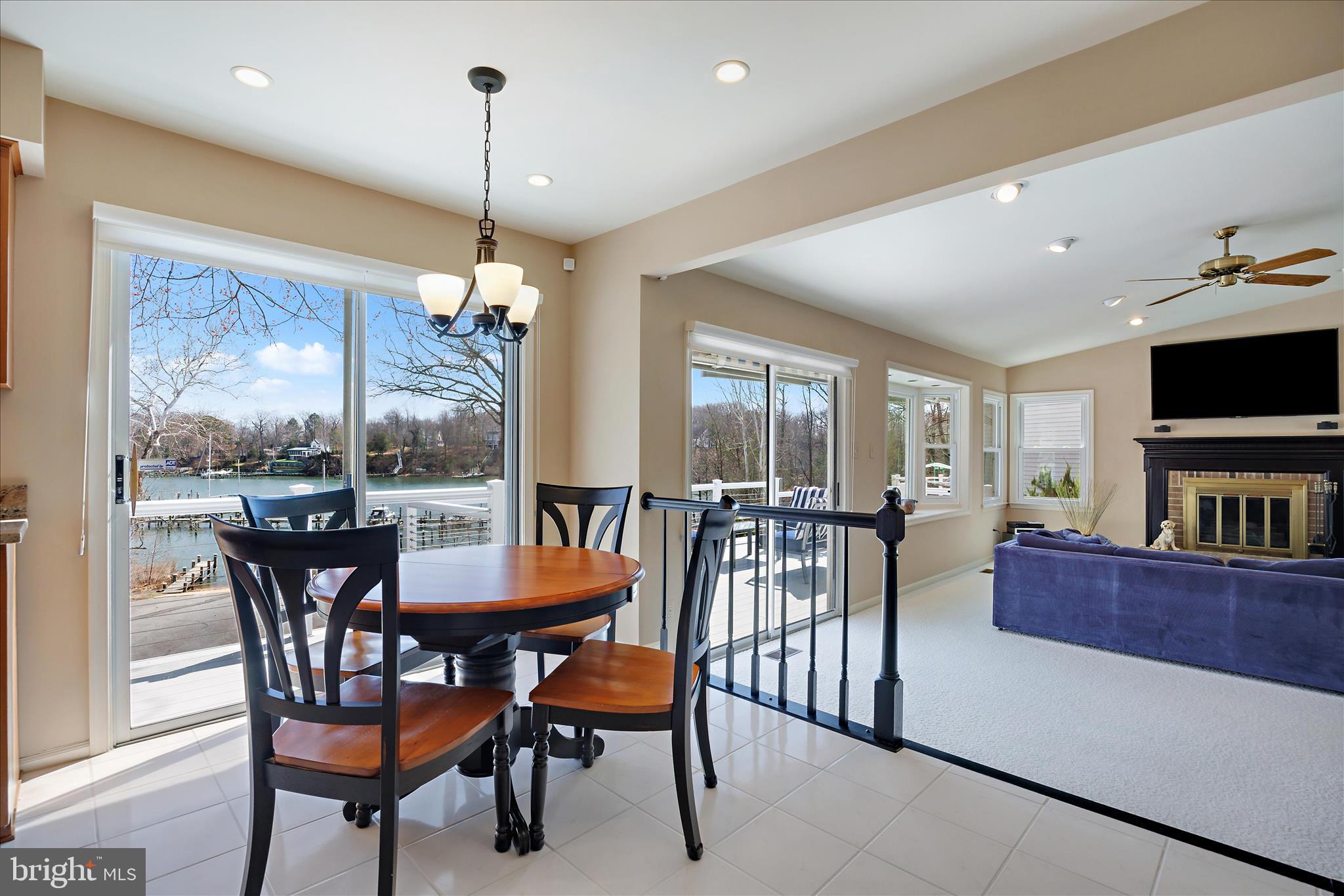 253 Milthorn Court Riva, MD 21140 - Photo 21 of 71 a dining room with furniture a chandelier and window
