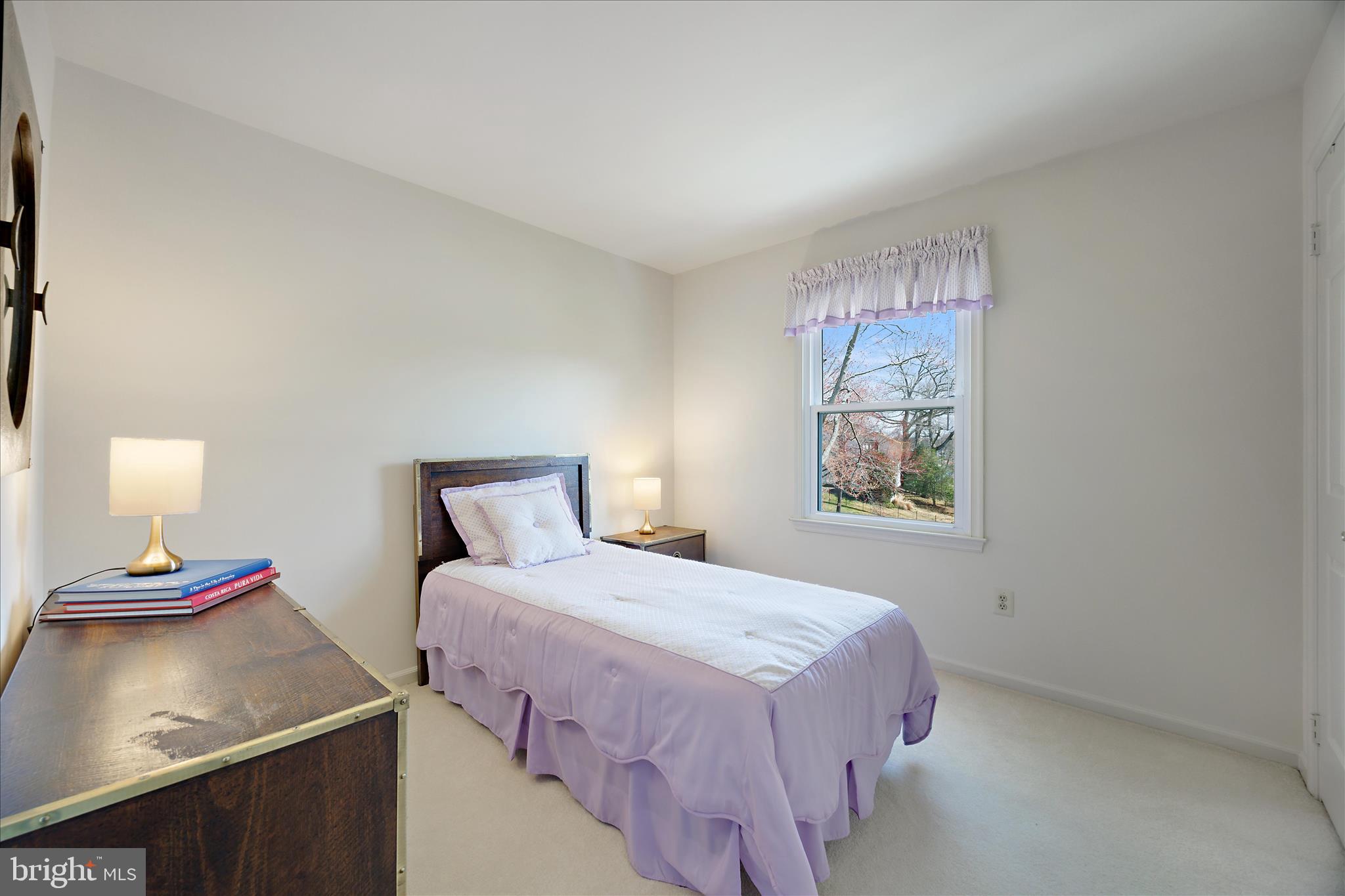 253 Milthorn Court Riva, MD 21140 - Photo 35 of 71 a bedroom with bed and window