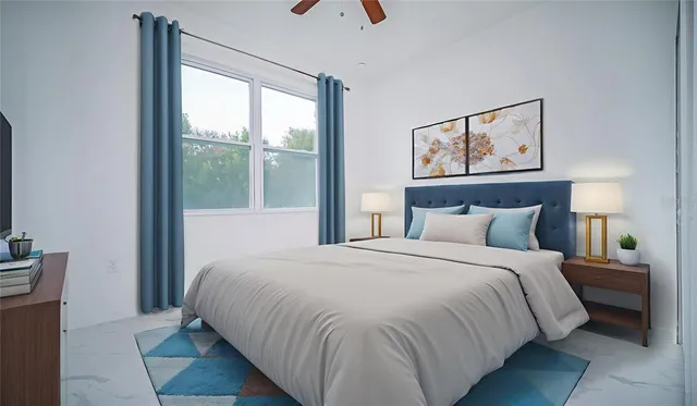 an aerial view of a residential houses with outdoor space