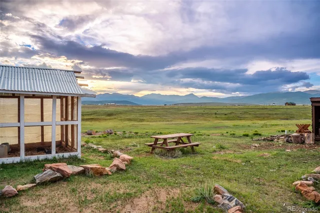 a view of an ocean and a mountain