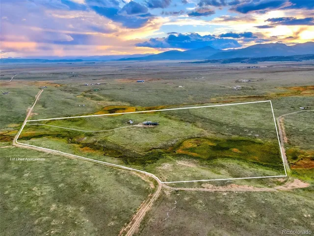 a view of a lake with a yard
