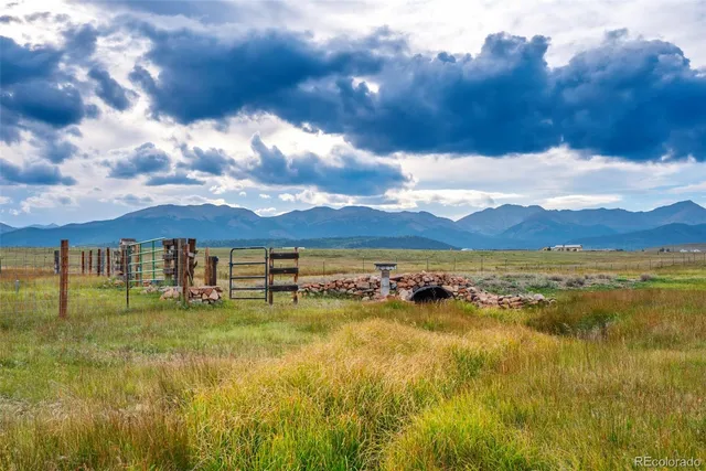 a view of an ocean and a yard