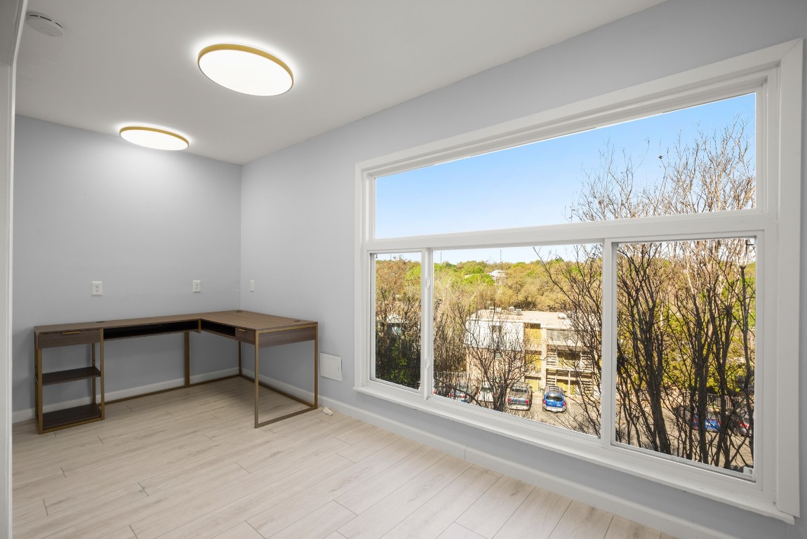 620 South 1st Street, Unit 315 Austin, TX 78704 - Photo 8 of 17 a view of a room with a large window