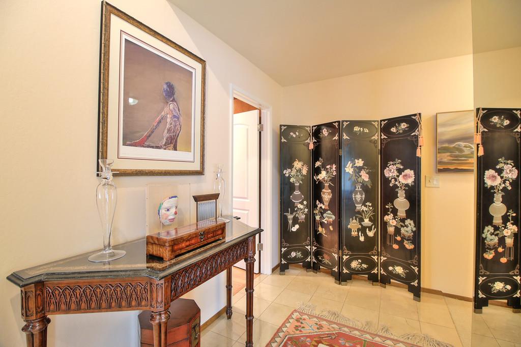 1115 Covington Road Los Altos, CA 94024 - Photo 20 of 39 a view of a livingroom with wooden floor and furniture