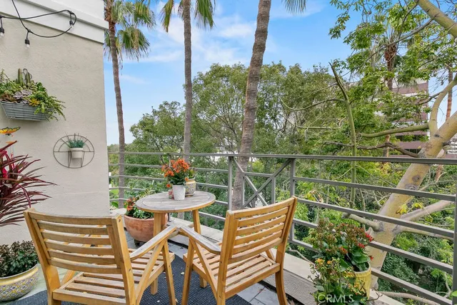 a view of a chairs and table on the terrace