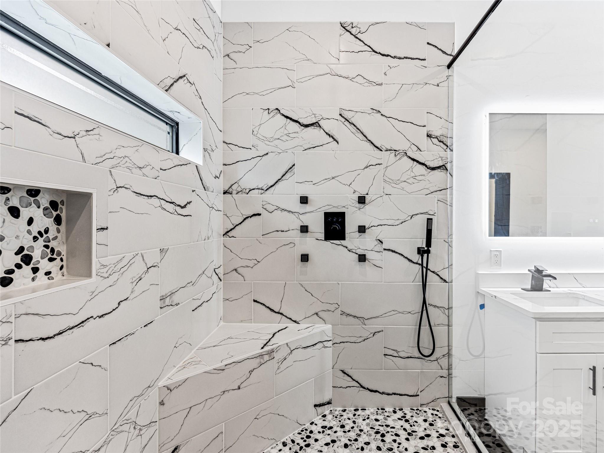 74 Jeranna Road Mills River, NC 28759 - Photo 14 of 42 a bathroom with a sink and a mirror