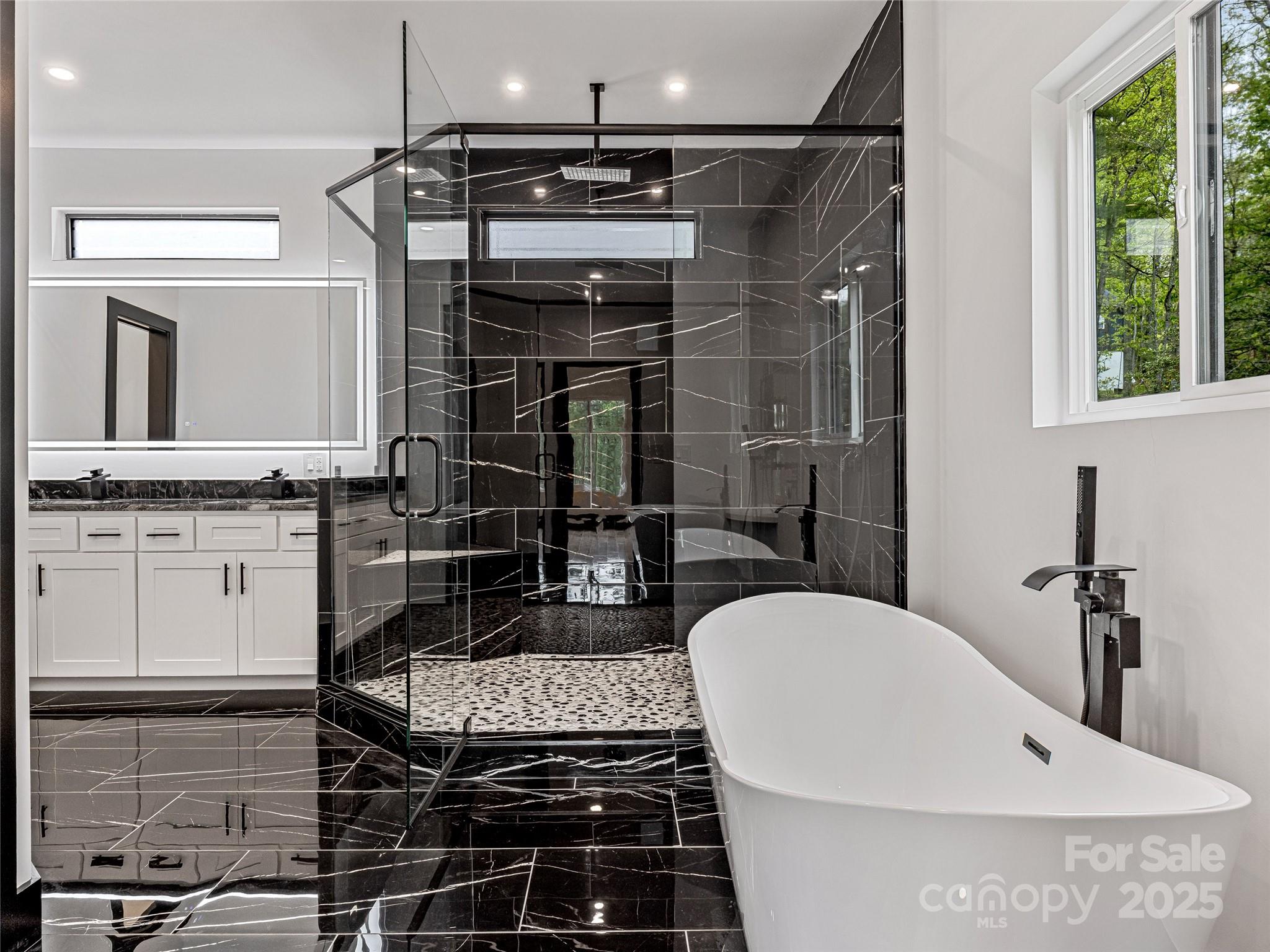 74 Jeranna Road Mills River, NC 28759 - Photo 29 of 42 a bathroom with a sink and a mirror