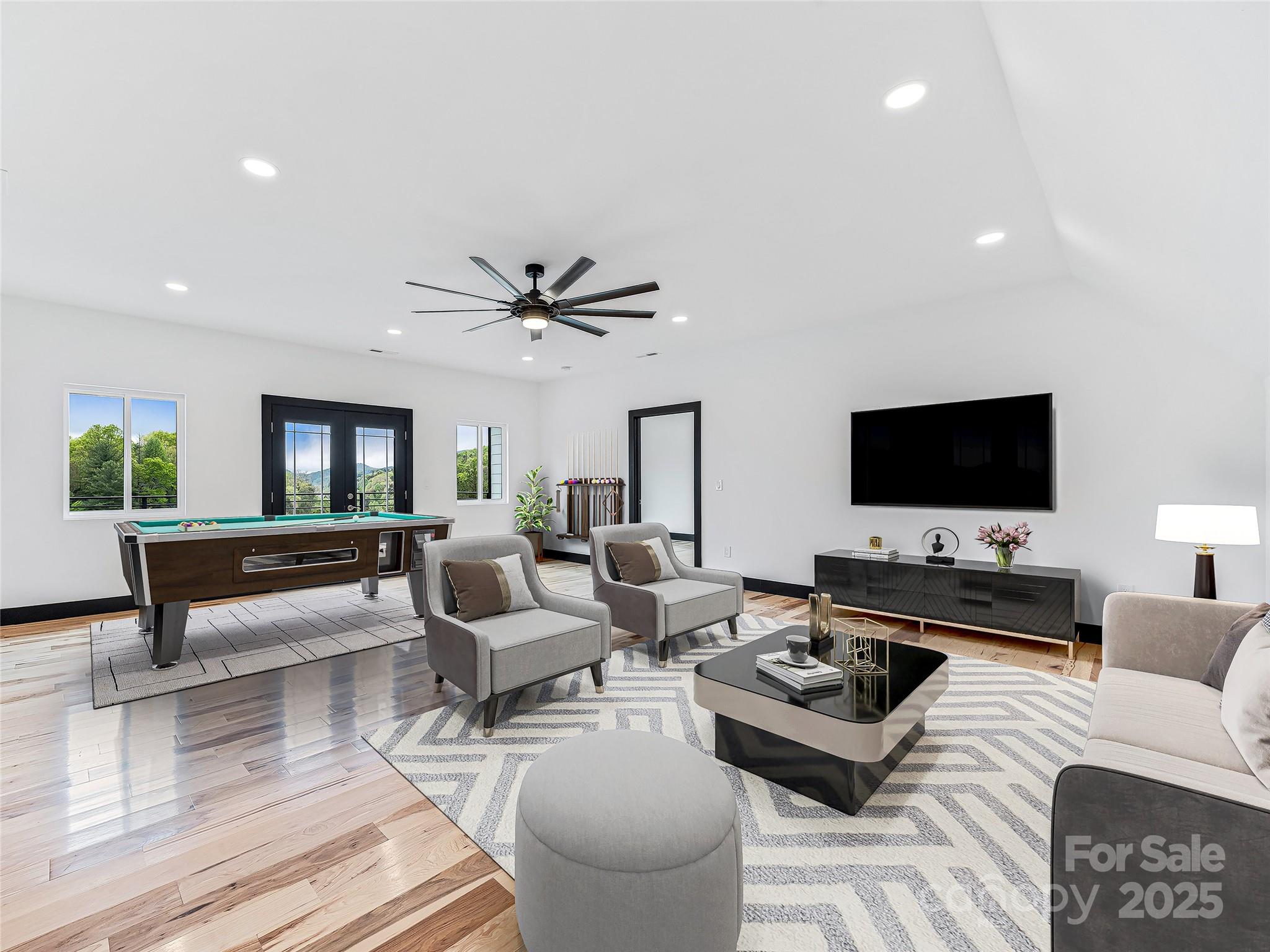 74 Jeranna Road Mills River, NC 28759 - Photo 33 of 42 a living room with furniture and a flat screen tv