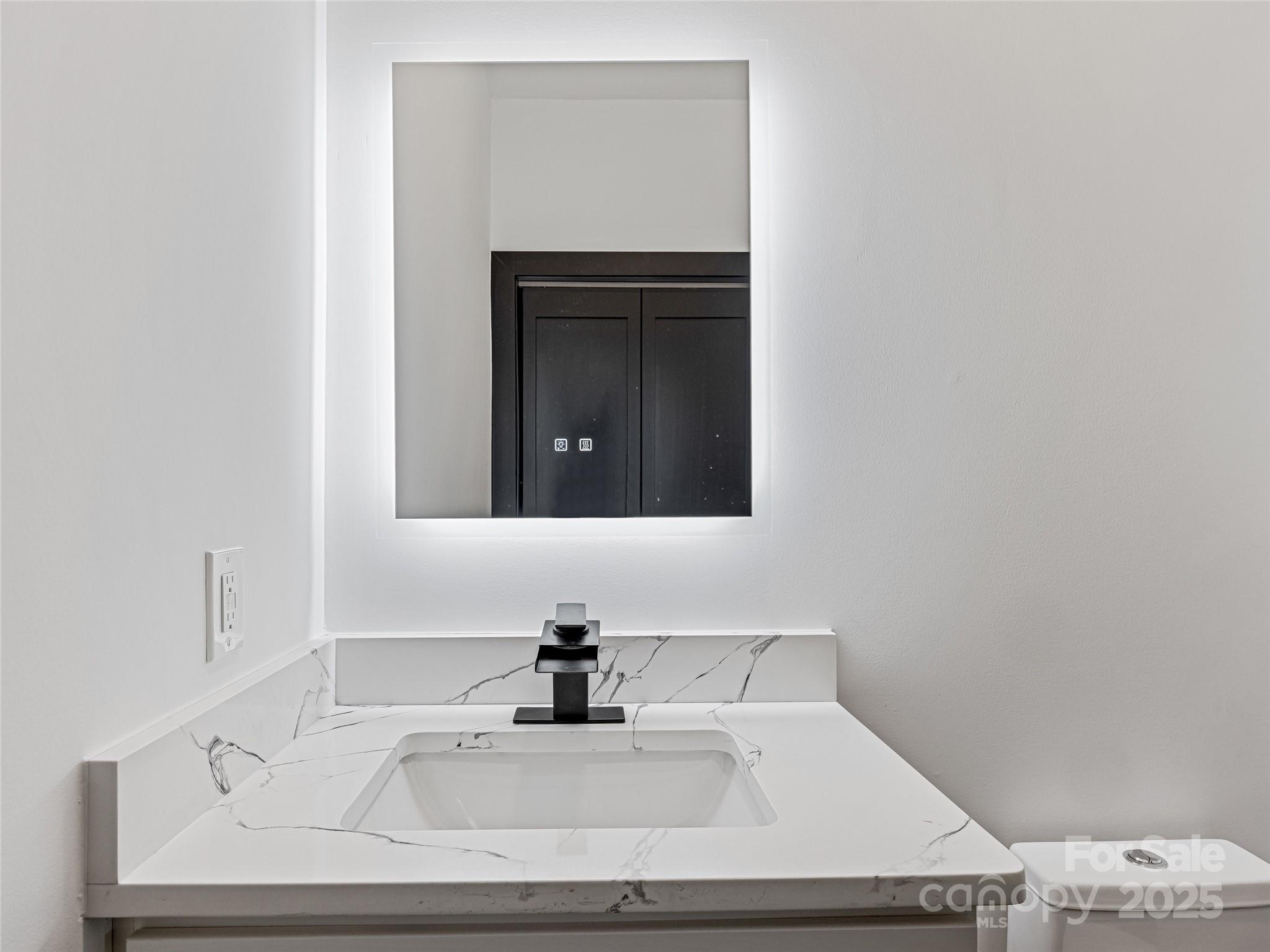 74 Jeranna Road Mills River, NC 28759 - Photo 9 of 42 a bathroom with a sink and a mirror