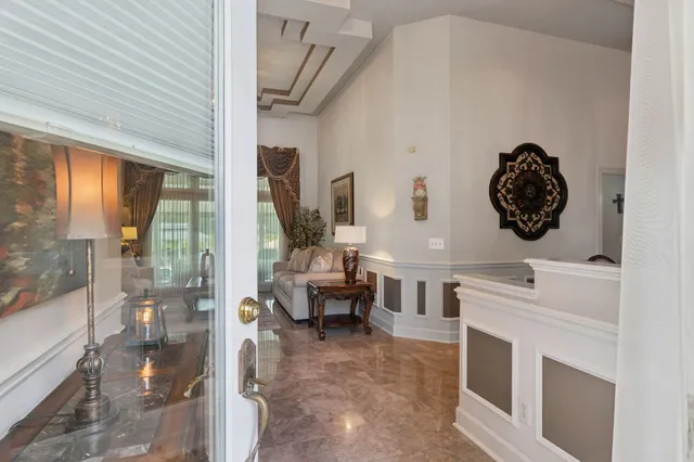 a living room with furniture flat screen tv and a fireplace