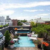 a view of a terrace with sitting area