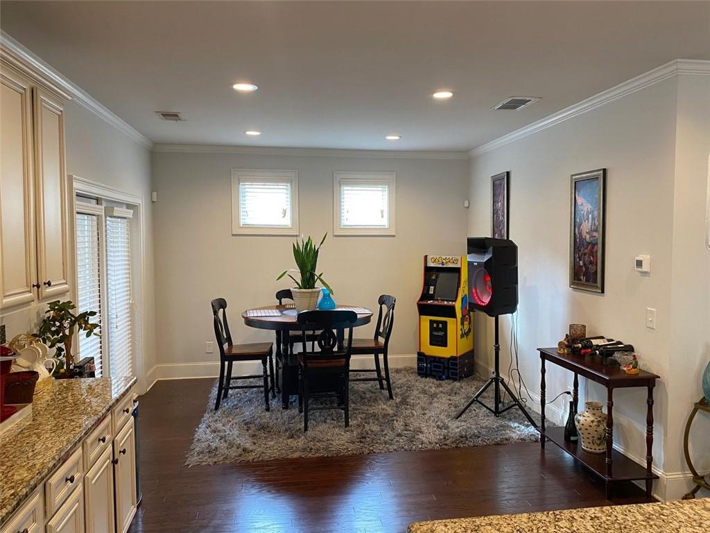 4806 Ralin Court Southwest Atlanta, GA 30331 - Photo 14 of 104 a view of a dining room with furniture window and wooden floor