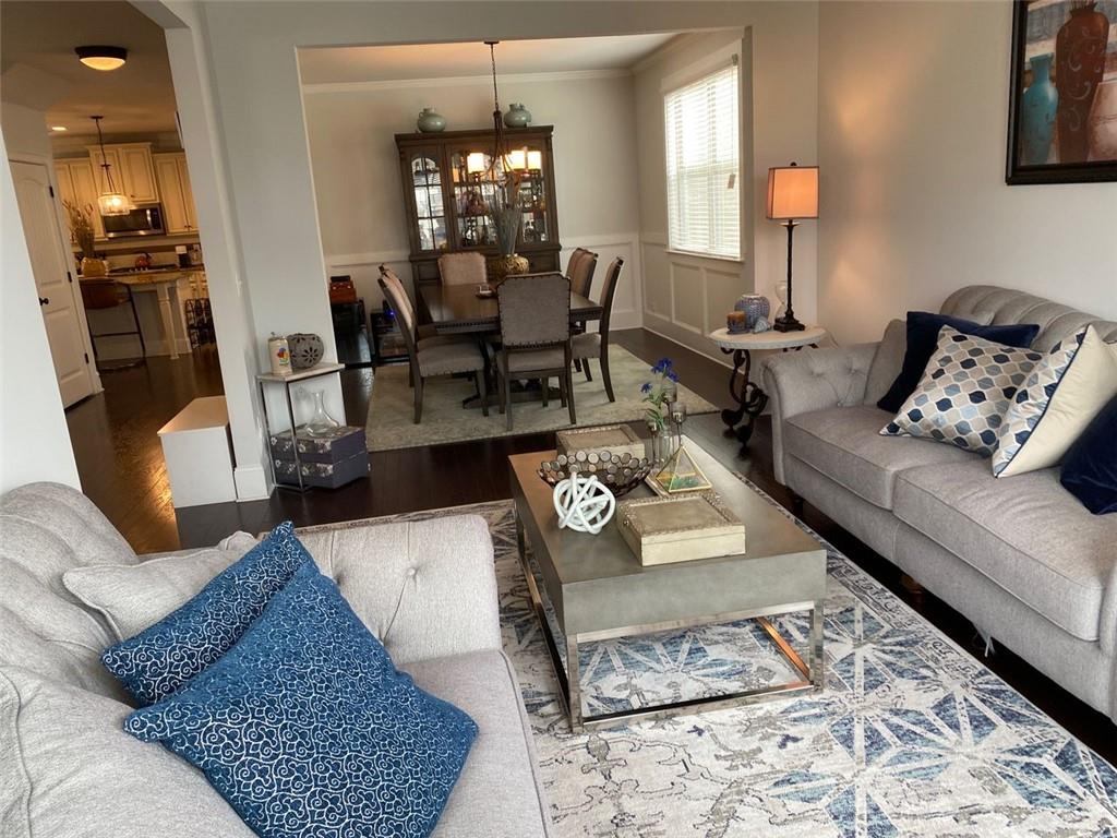 4806 Ralin Court Southwest Atlanta, GA 30331 - Photo 27 of 104 a living room with furniture and a dining table