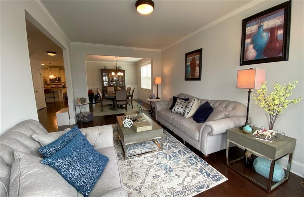 4806 Ralin Court Southwest Atlanta, GA 30331 - Photo 28 of 104 a living room with furniture and wooden floor
