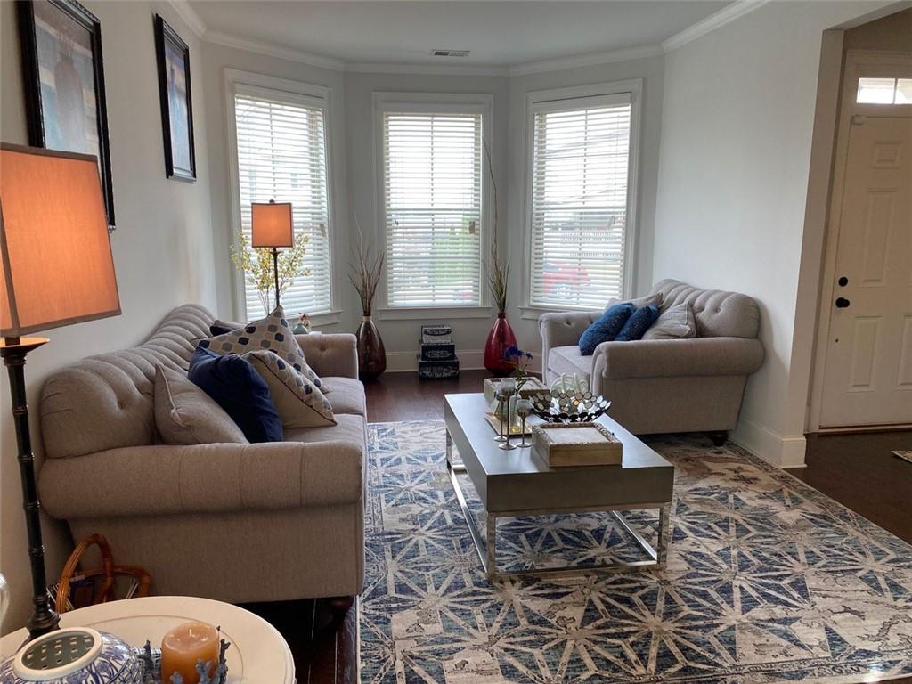 4806 Ralin Court Southwest Atlanta, GA 30331 - Photo 30 of 104 a living room with furniture and a large window