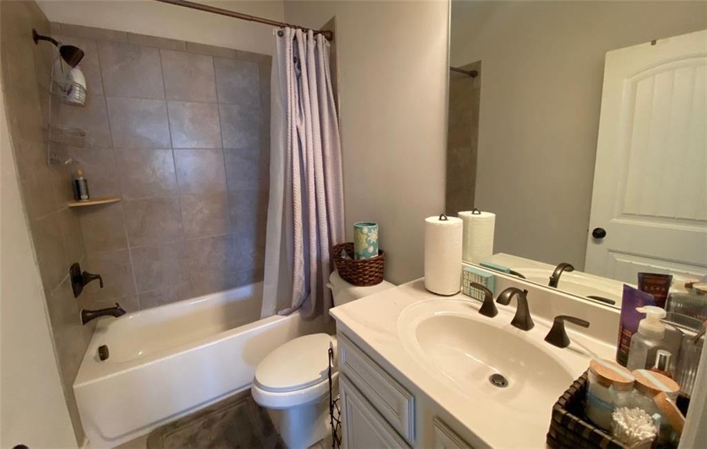 4806 Ralin Court Southwest Atlanta, GA 30331 - Photo 71 of 104 a bathroom with a sink toilet and shower