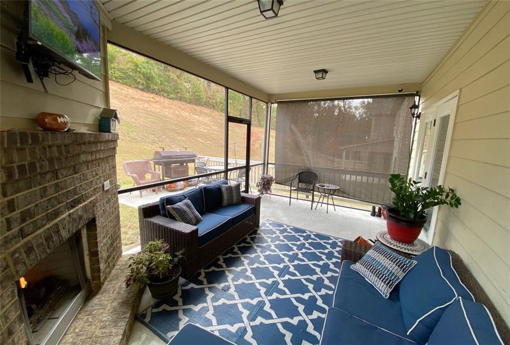 4806 Ralin Court Southwest Atlanta, GA 30331 - Photo 78 of 104 a living room with furniture and a potted plant