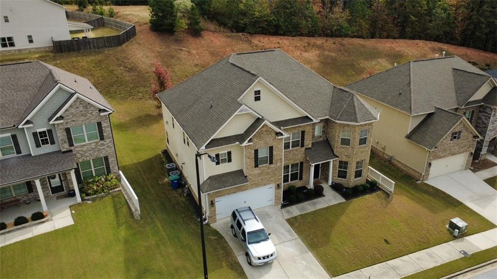 4806 Ralin Court Southwest Atlanta, GA 30331 - Photo 86 of 104 an aerial view of a house with swimming pool and large trees