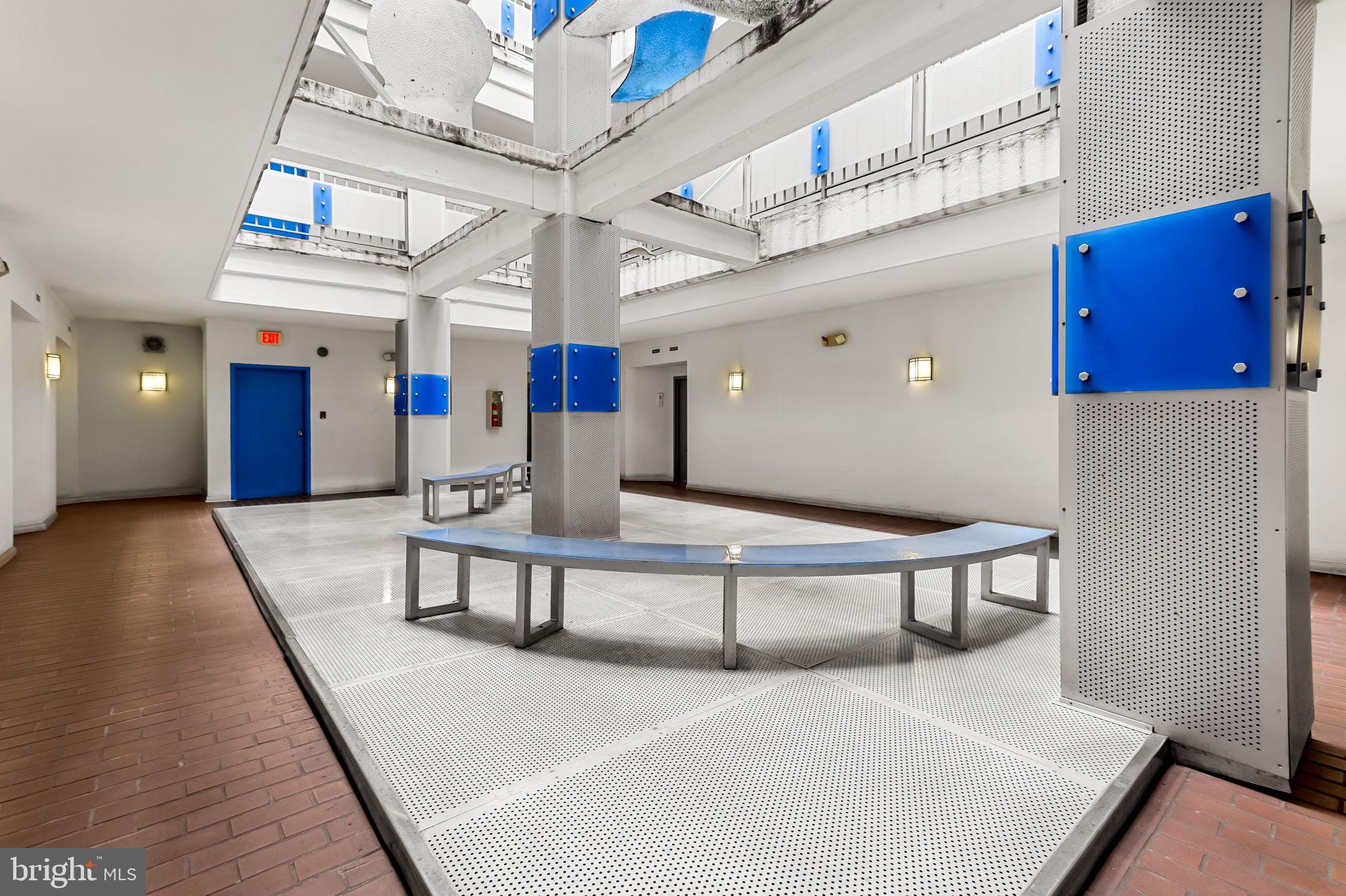 1011 Hunter Street, Unit A4 Baltimore, MD 21202 - Photo 13 of 34 a lobby with furniture and wooden floor