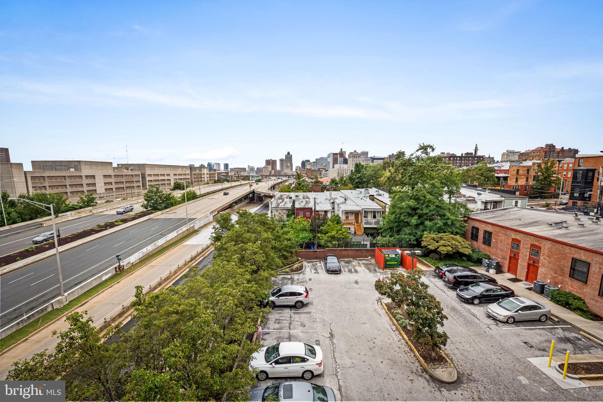 1011 Hunter Street, Unit A4 Baltimore, MD 21202 - Photo 34 of 34 a view of city from balcony with furniture