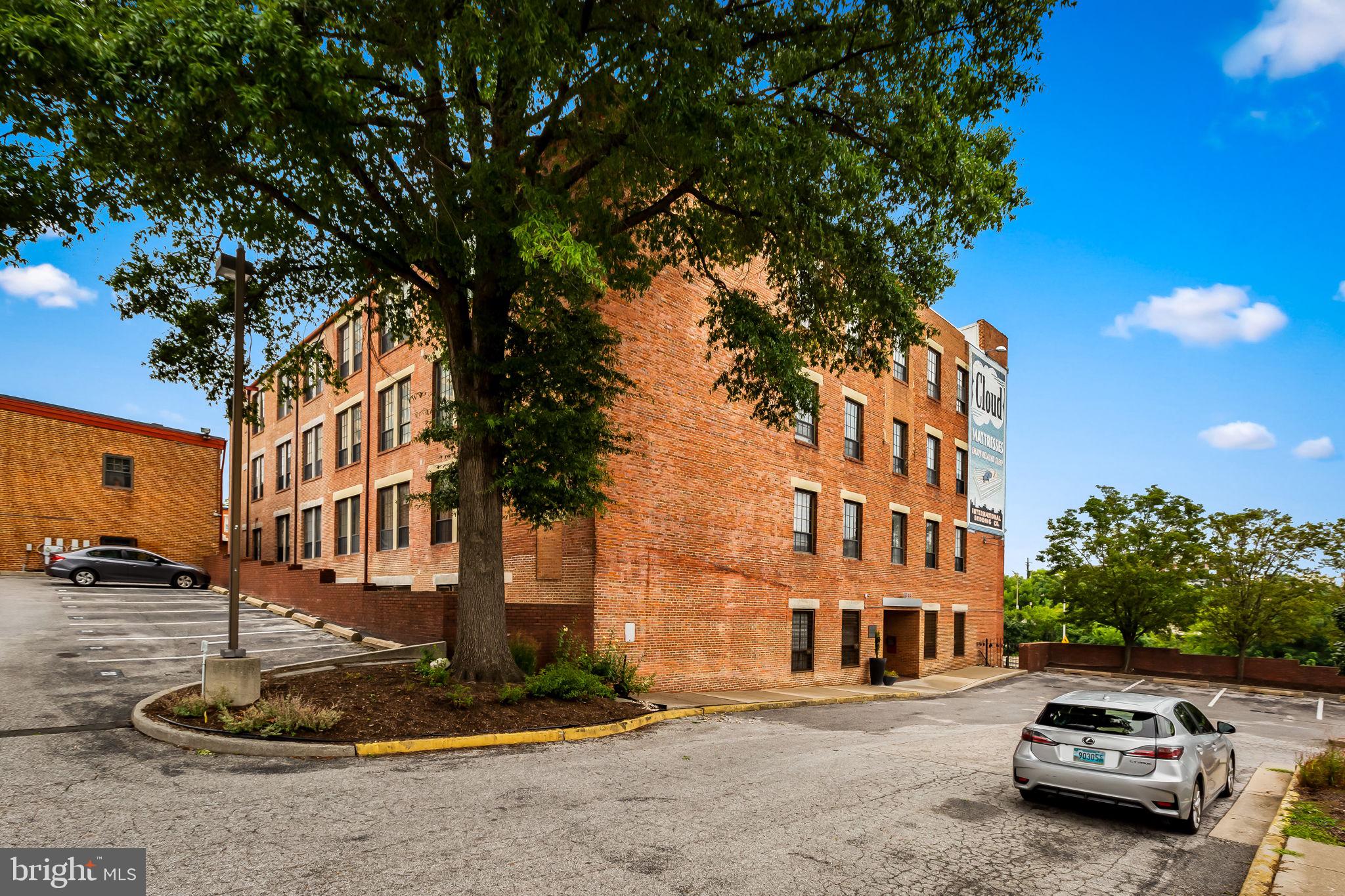 1011 Hunter Street, Unit A4 Baltimore, MD 21202 - Photo 4 of 34 a car parked in front of a building