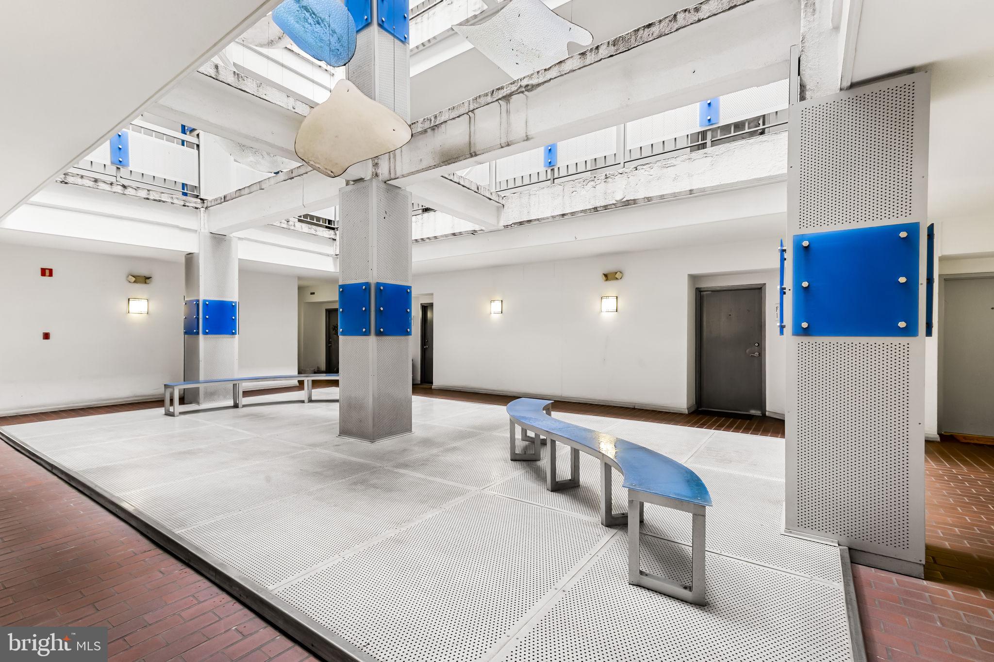 1011 Hunter Street, Unit A4 Baltimore, MD 21202 - Photo 8 of 34 a large kitchen with a table and chairs