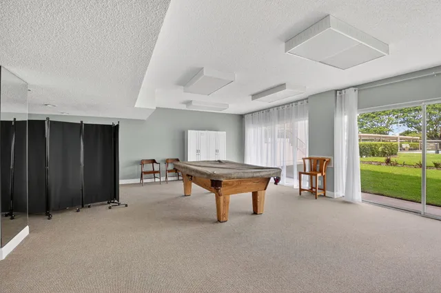 a room with furniture and a window