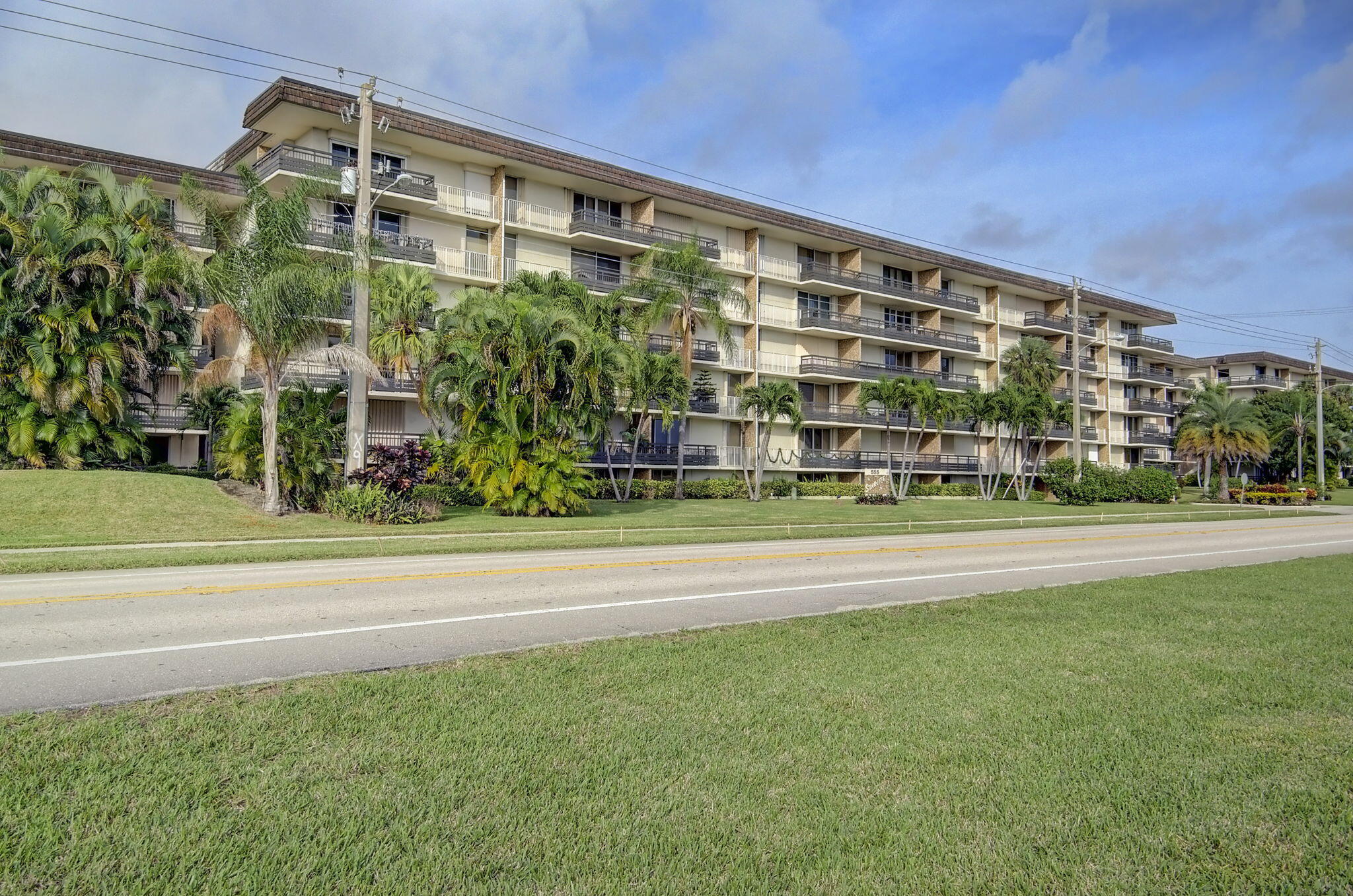 555 Northwest 4th Avenue, Unit 4230 Boca Raton, FL 33432 - Photo 33 of 38 a view of building with yard