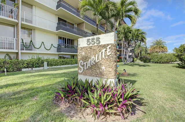 a sign that is on the side of a building