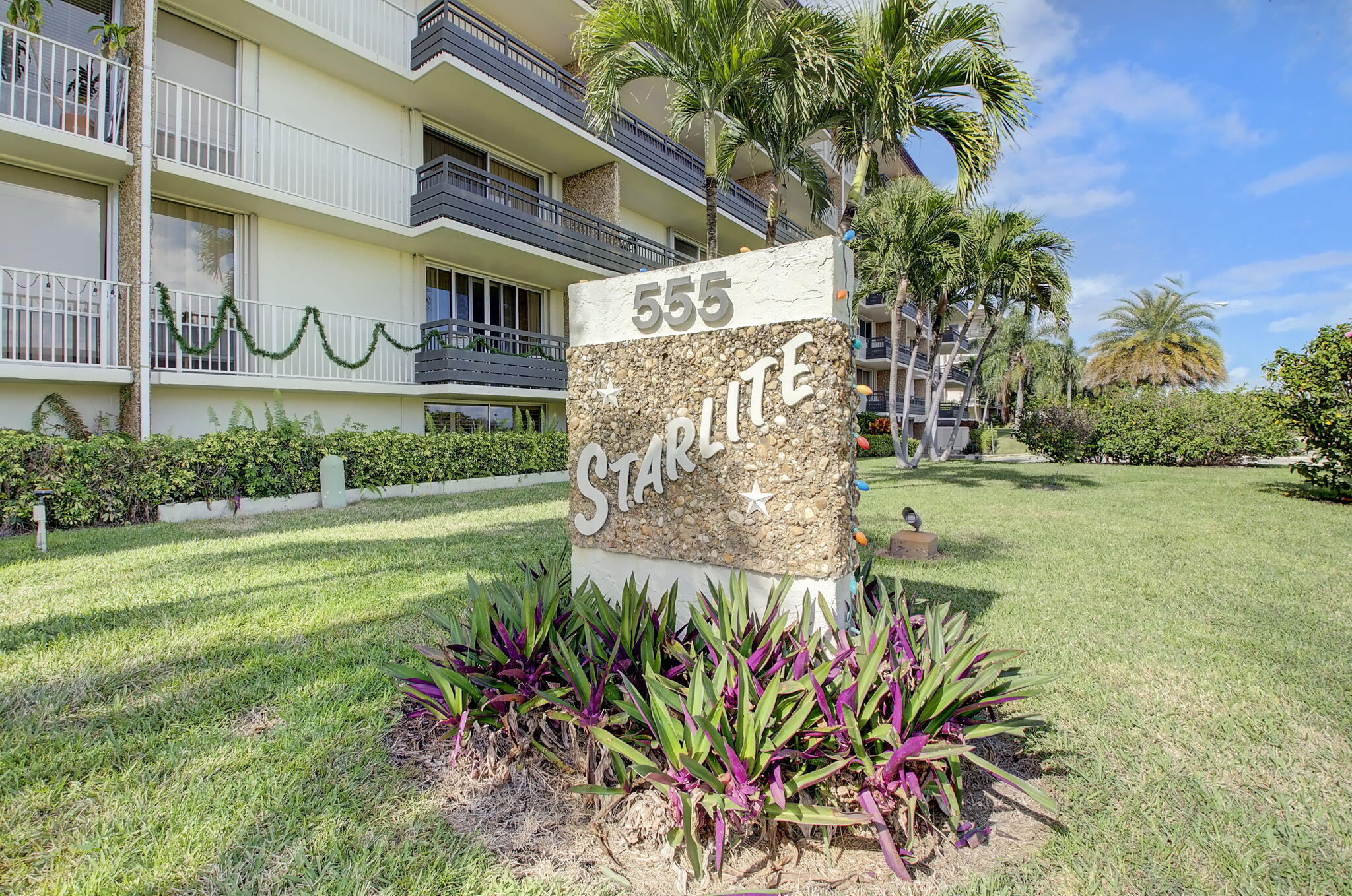 555 Northwest 4th Avenue, Unit 4230 Boca Raton, FL 33432 - Photo 34 of 38 a sign that is on the side of a building