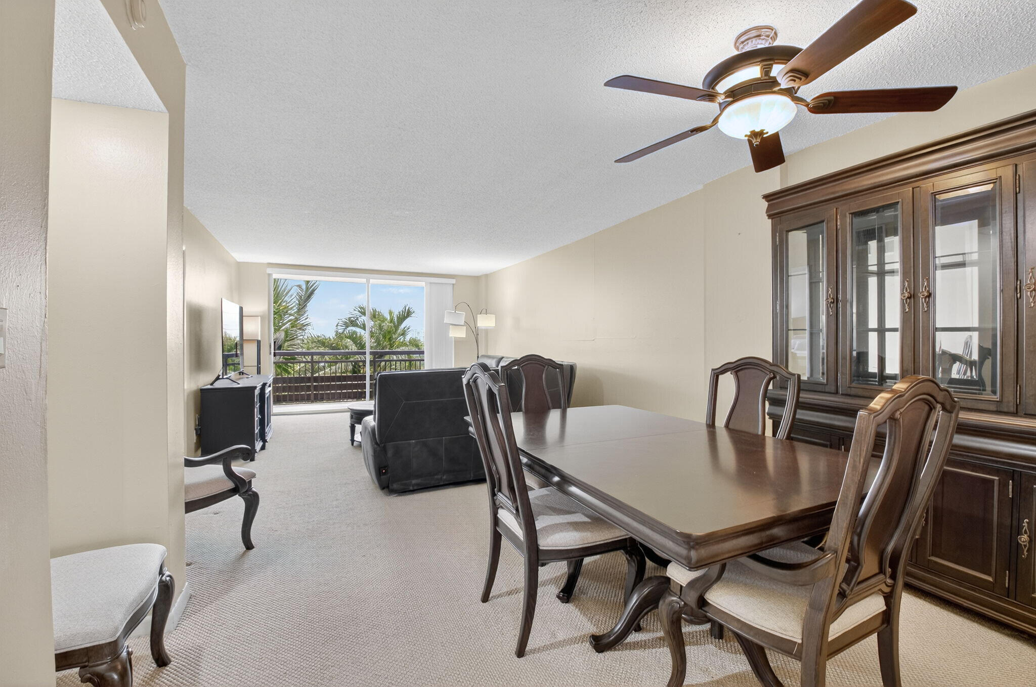 555 Northwest 4th Avenue, Unit 4230 Boca Raton, FL 33432 - Photo 5 of 38 a view of a dining room with furniture