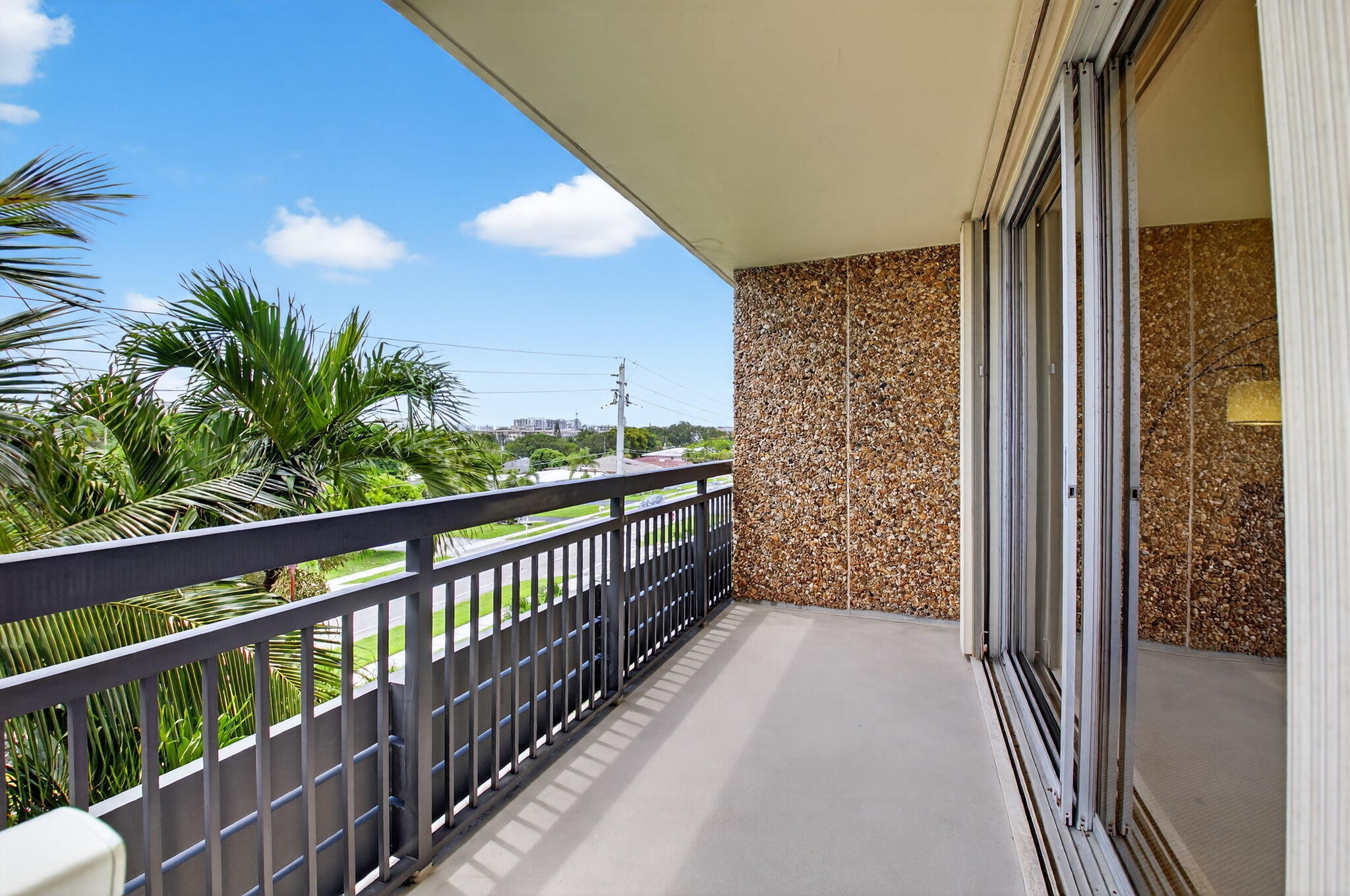 555 Northwest 4th Avenue, Unit 4230 Boca Raton, FL 33432 - Photo 7 of 38 a view of balcony with furniture