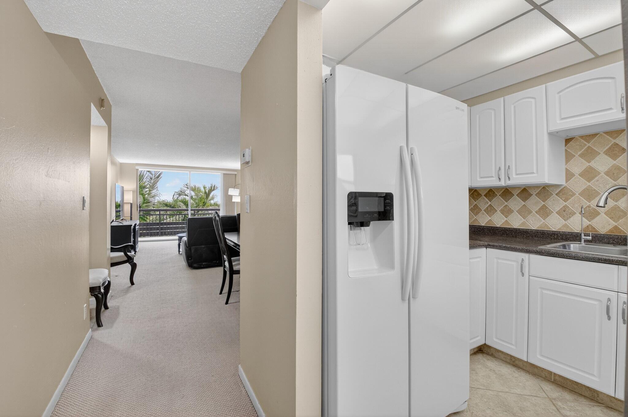 555 Northwest 4th Avenue, Unit 4230 Boca Raton, FL 33432 - Photo 10 of 38 a walk in closet with window