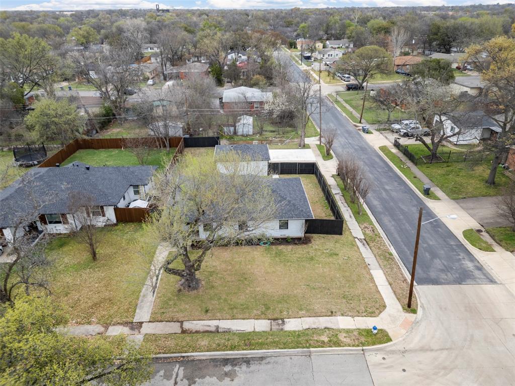 2945 Healey Drive Dallas, TX 75228 - Photo 34 of 38 an aerial view of residential houses with outdoor space