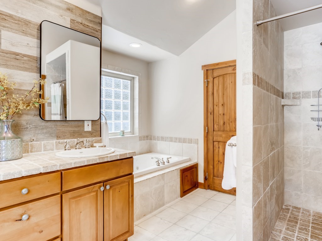 344 Rena Road Breckenridge, CO 80424 - Photo 14 of 32 Master bathroom with a jacuzzi tub & double sinks.