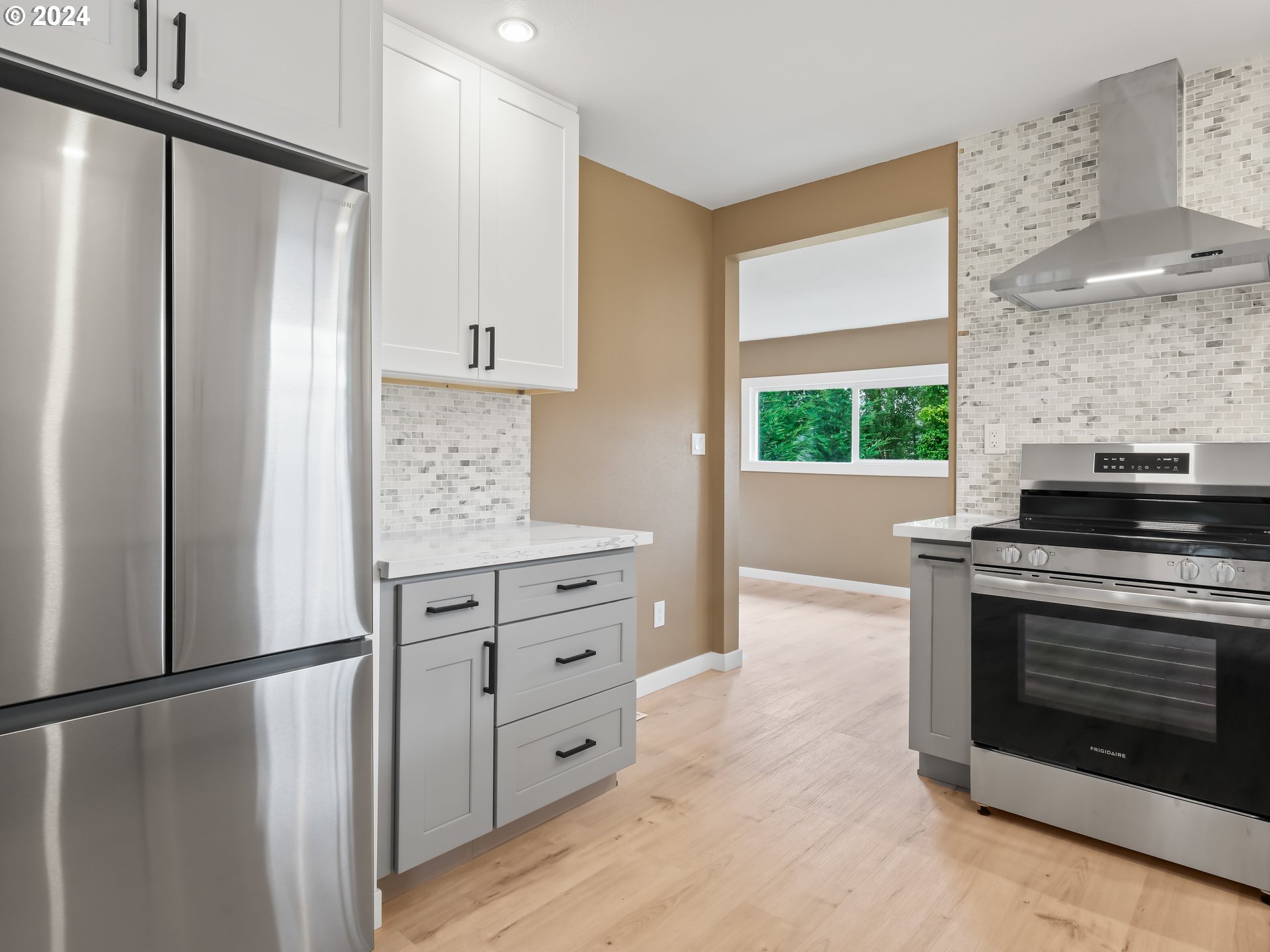 1903 14th Street Oregon City, OR 97045 - Photo 12 of 34 a kitchen with cabinets and stainless steel appliances