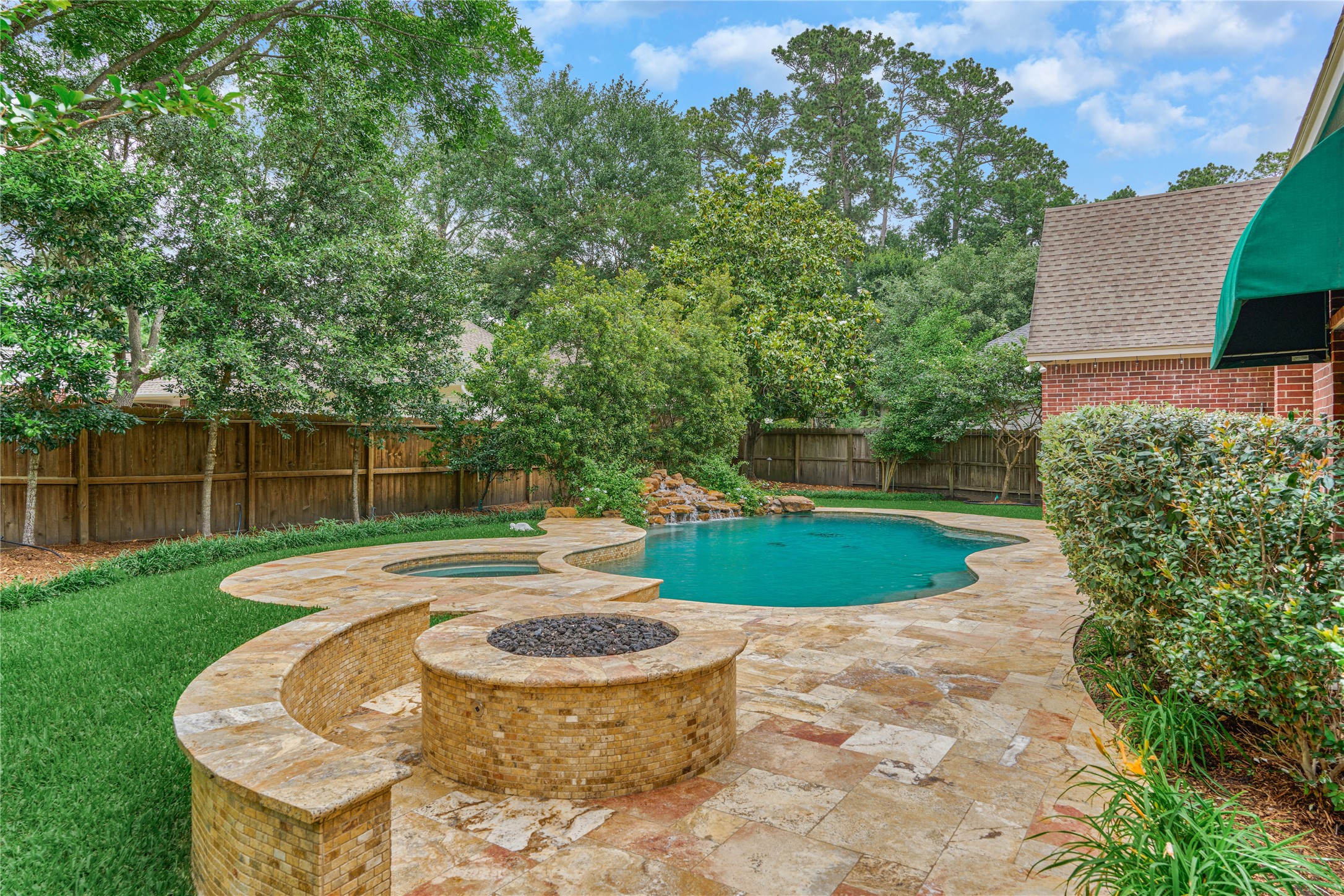 7 Gentry Oak Court Spring, TX 77381 - Photo 42 of 50 a view of a backyard with swimming pool