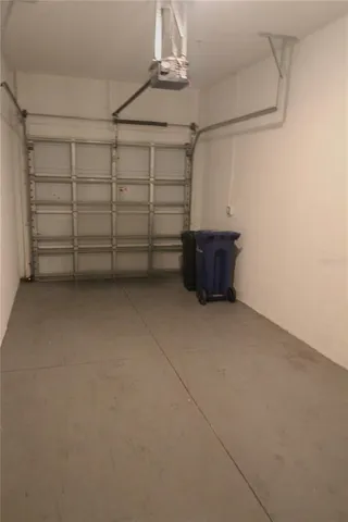 a view of a balcony with wooden floor