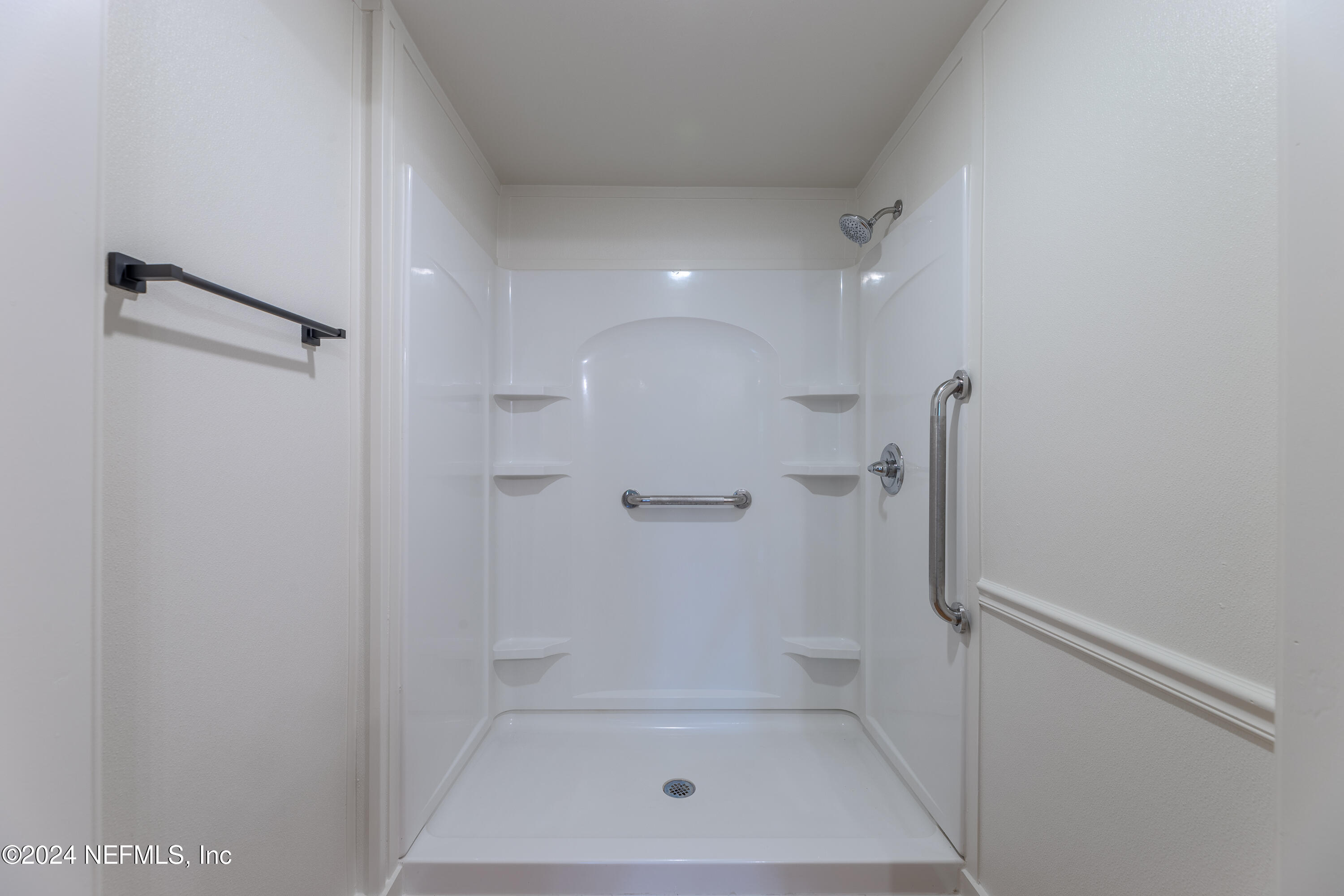 90 Spring Street St. Augustine, FL 32084 - Photo 19 of 24 a bathroom with a shower