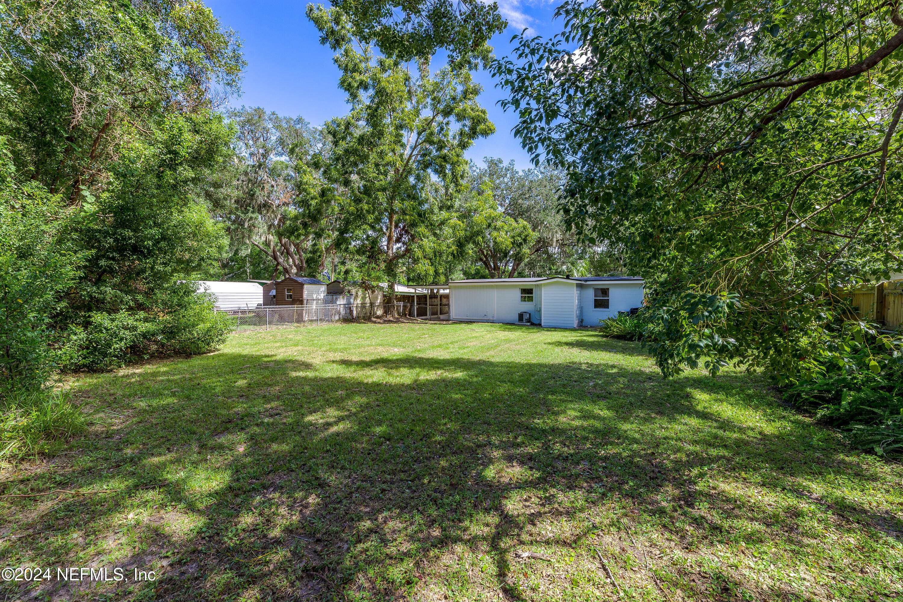 90 Spring Street St. Augustine, FL 32084 - Photo 24 of 24 a view of a house with a yard