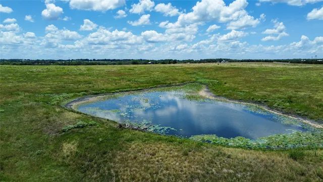 a view of a golf course with a garden