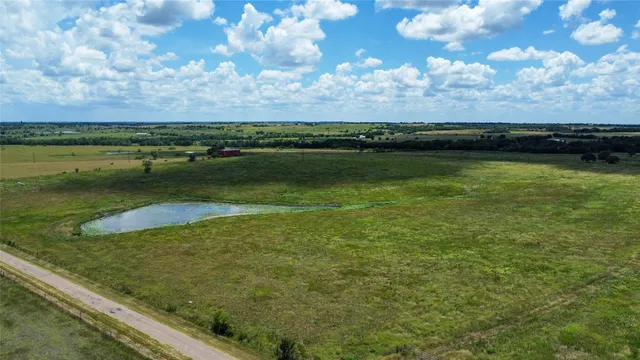 a view of a lake from a yard