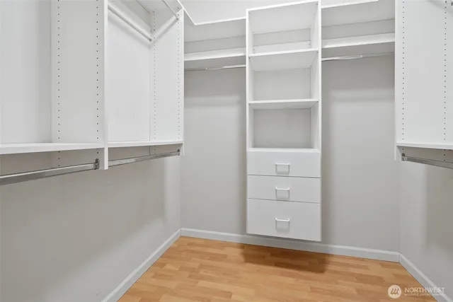 a view of an empty walk in closet
