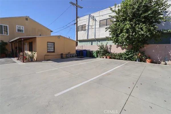 a view of a house with a yard and garage