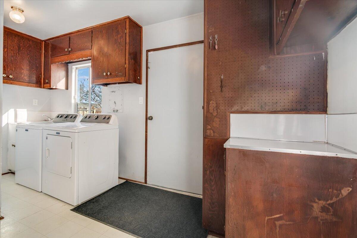 230 North D Street Lompoc, CA 93436 - Photo 11 of 29 a kitchen with a sink a stove a refrigerator and cabinets
