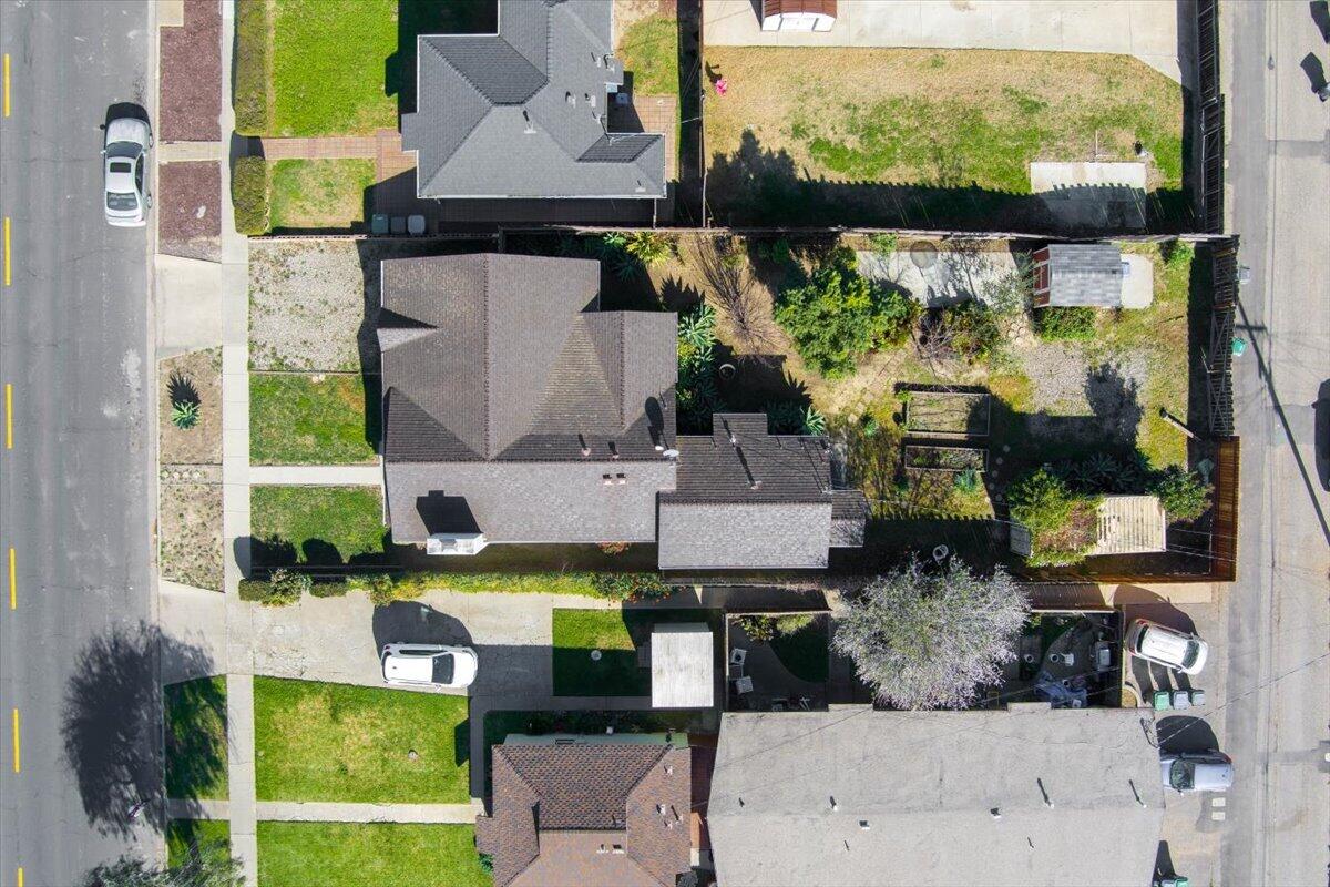 230 North D Street Lompoc, CA 93436 - Photo 27 of 29 an aerial view of a house with swimming pool garden and patio