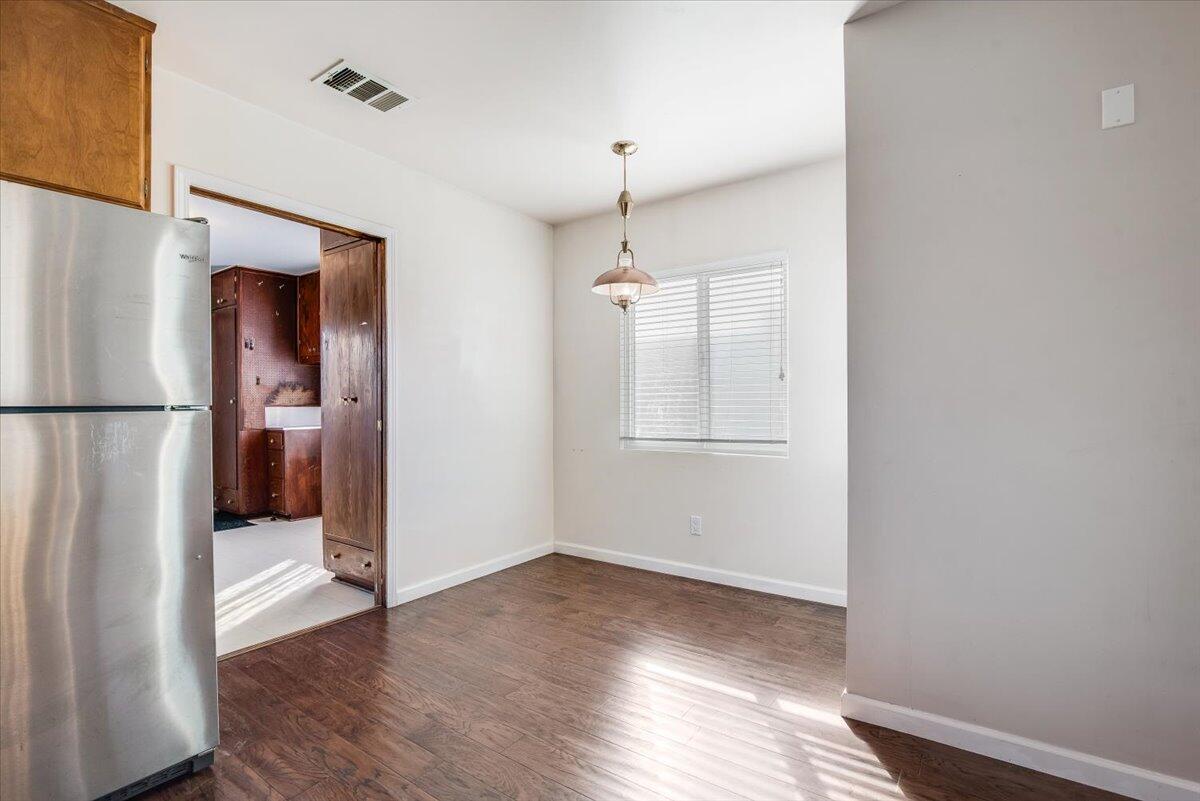 230 North D Street Lompoc, CA 93436 - Photo 7 of 29 a view of a hallway with wooden floor and entryway