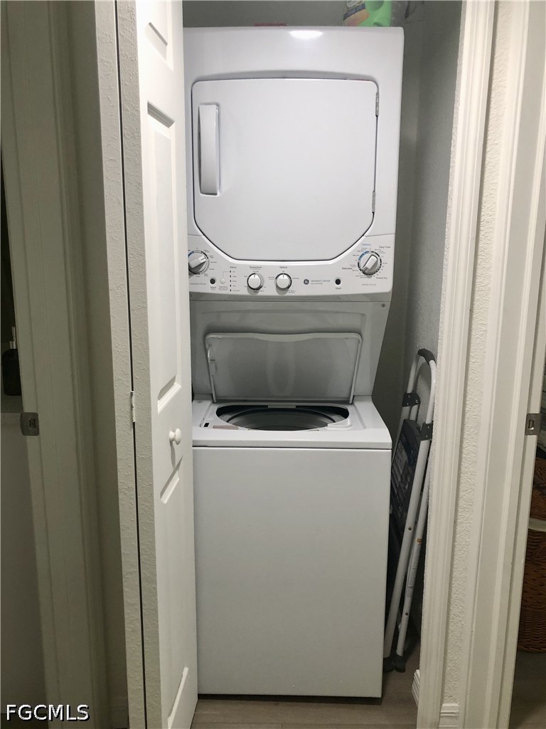 16881 Davis Road, Unit 214 Fort Myers, FL 33908 - Photo 23 of 46 a utility room with dryer and washer